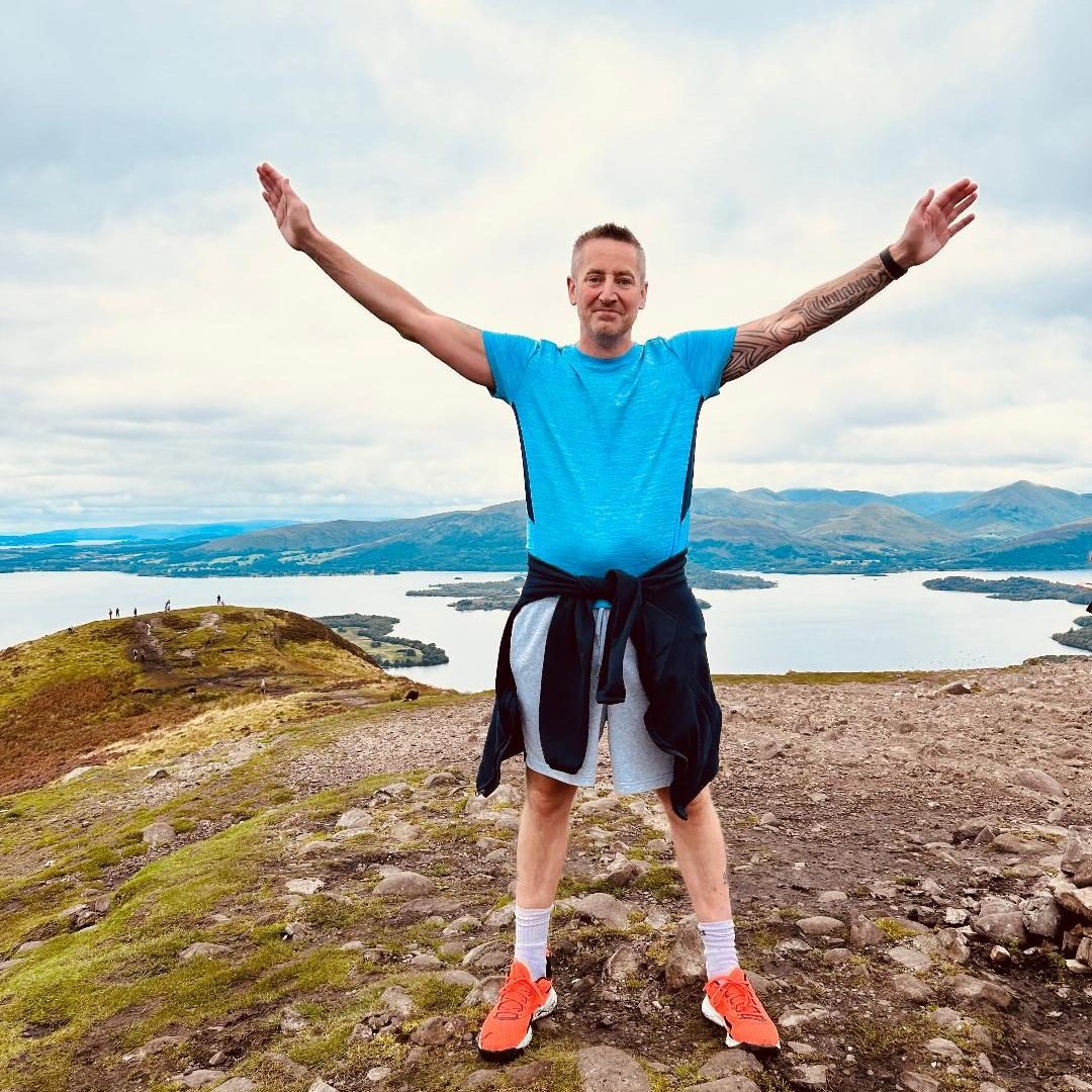 ImgJM20230922d Jonny at top of a mountain